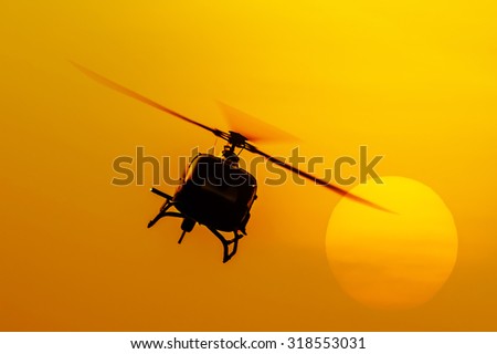 The patrol helicopter flying in the sky