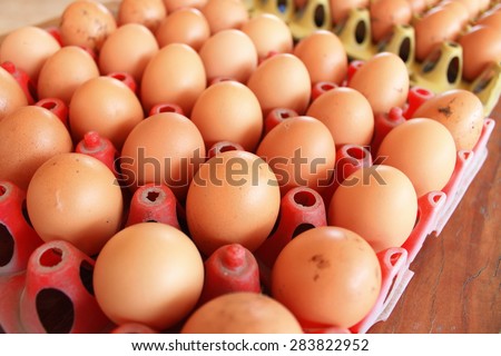 Red Eggs Crates of eggs at farmers market.