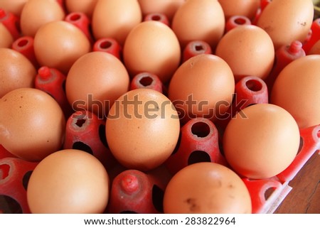 Red Eggs Crates of eggs at farmers market.