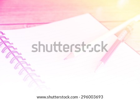 motion blur sweet Notebook and pencil on guitar,Writing music