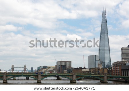 LONDON, ENGLAND, MAY 2014 - The Shard at the south bank of the river Thames in London, England. Photo taken on may 31st, 2014