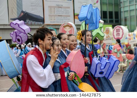 SEOUL KOREA MAY 12:People in traditional clothes take picture before participate Culture Performance for celebration of Lotus Lantern Festival at Jogyesa Temple on may 12 2013  Seoul, South Korea.