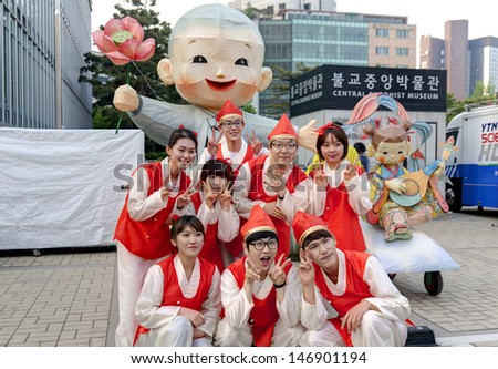 SEOUL KOREA MAY 12:People in traditional clothes take picture before participate Culture Performance for celebration of Lotus Lantern Festival at Jogyesa Temple on may 12 2013 Seoul, South Korea.