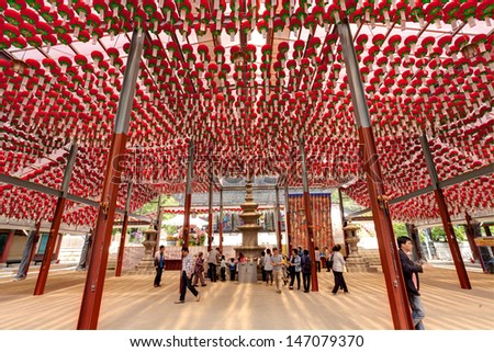 SEOUL KOREA MAY 11:People visiting the Bongeun-sa Temple which decorated by a lot of red lanterns for celebration of Buddha\'s birthday on may 11 2013 Seoul, South Korea.