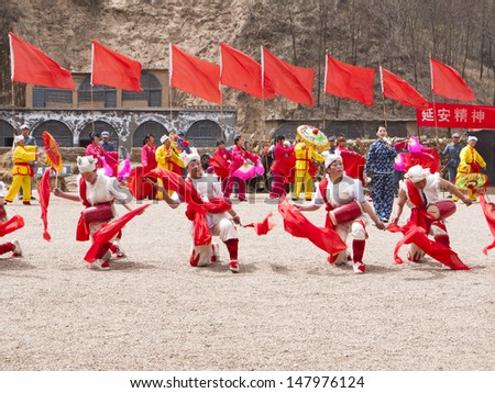 YANAN CHINA APRIL 20: People performing Ansai Waist Drum Dance which is a folk dance with a history of more than 2,000 years on april 20 2012 at Yanan, China.