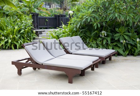 Lounge chairs in the garden,