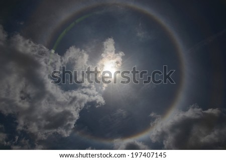 Beautiful sun halo with the blue sky and cloud