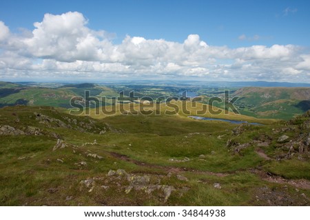 This image shows the view from Place Fell, down towards the valley, with Ullswater shown in the distance.