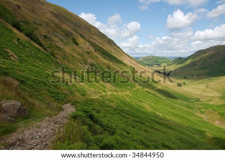 This valley in the Lake District is a classic study of a U-shape, carved out by glacial erosion. It is part of a walk leading to Place Fell.