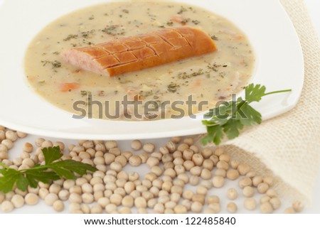 Polish soup with dry pea on white background