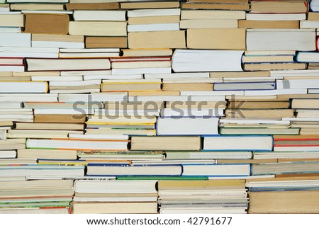 heap of old and new  books on background
