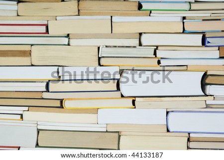 heap of old and new  books on background