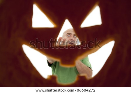 Halloween pumpkin seen from inside as background