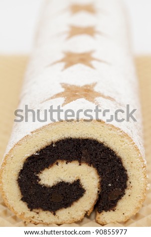 poppy-seed cake with star shape and sugar on cake