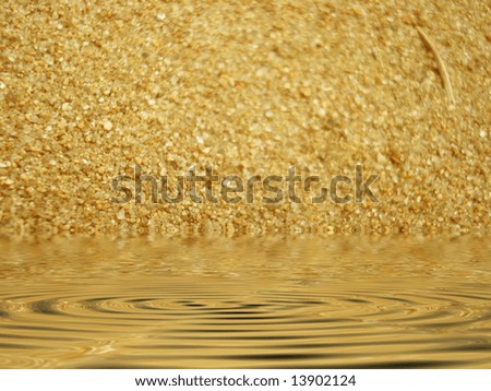this photo is about gold sand and water