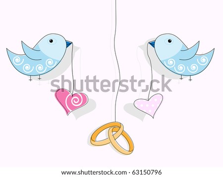Wedding rings hearts and blue birds