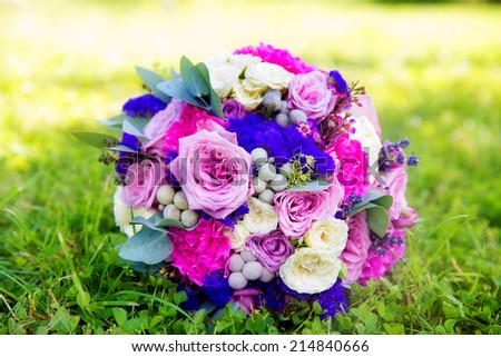 wedding bouquet of roses in purple tones. Floristic composition in vintage style. The Provence.