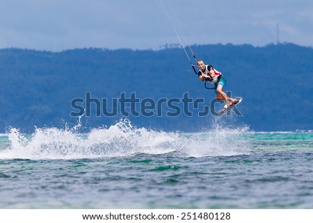 Boracay island, Philippines - January 28, 2015 : unidentified kite-surfer performs in competitions \