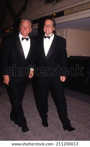Hollywood, California - Circa 1991: Michael and Kirk Douglas attending a black tie event at the Beverly Hilton Hotel