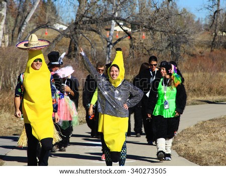 WESTMINSTER, COLORADO - November 14, 2015 - Two people dressed in banana costumes and participating in the Denver Gorilla Run to raise funds for the Gorilla Conservation Fund in Africa