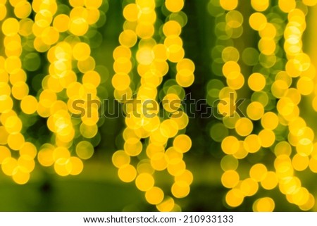 Lights Festive background. Abstract Christmas twinkled bright background with bokeh defocused lights
