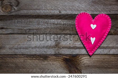 Vintage wooden background with hand made heart. Special love card for Valentine\'s Day