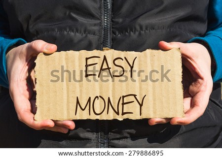 Girl holding a carton paper with text Easy money