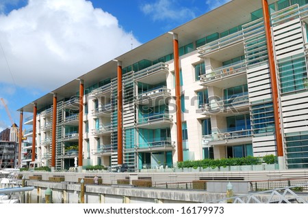 luxury apartment exterior with blue sky background