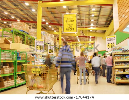 people\'s motion in busy supermarket