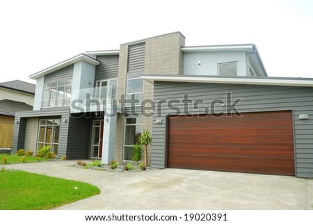brand new show home with landscaped front yard