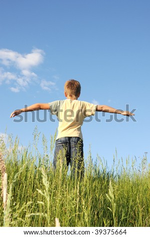 Man with his arms wide open his arms - freedom concept