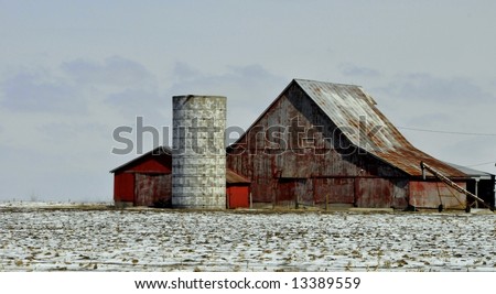 Midwest farm barn and silo during winter