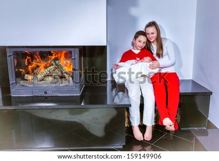 Happy family and fireplace