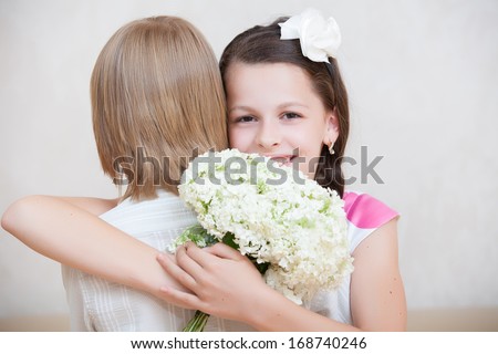 boy giving flowers to girl