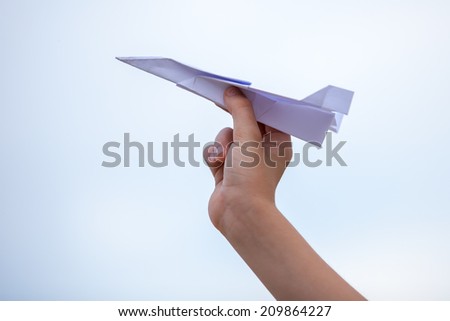 Paper airplane and blue sky