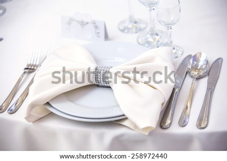 Elegant tables set up for a wedding banquet