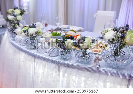 Table decor with flowers table numbers and candles