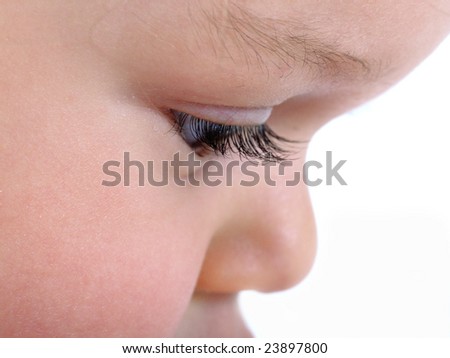 just eye with eyelashes of one year old child isolated on white