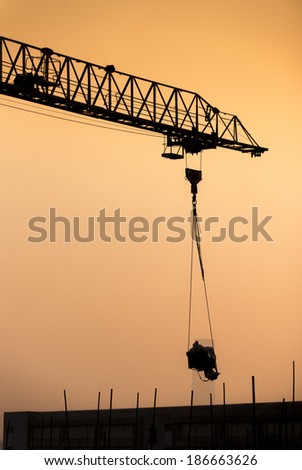 Heavy lifting crane in construction site