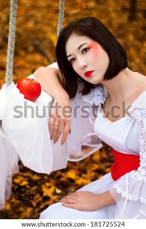 A woman dressed up like a Geisha