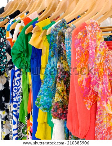 female colorful fashion clothing on hanging
