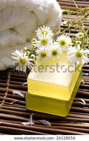 Spa towel ,flower with soap on bamboo mat