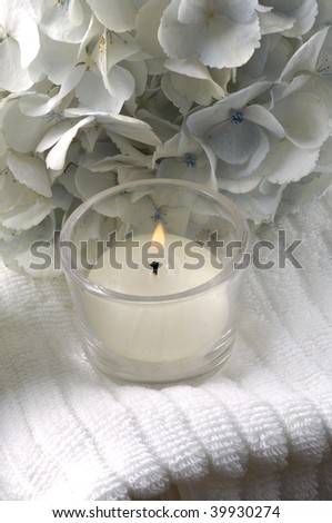 candle making nice spa composition for bathroom with towel