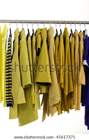 fashion yellow clothing hanging as display