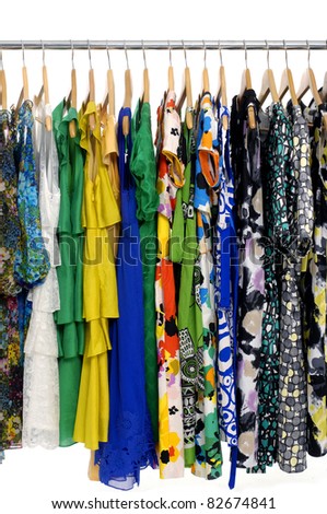 colorful clothes choice of casual clothes on wooden hangers