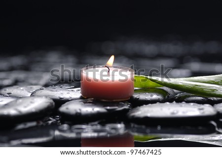 aromatherapy candle on zen stones