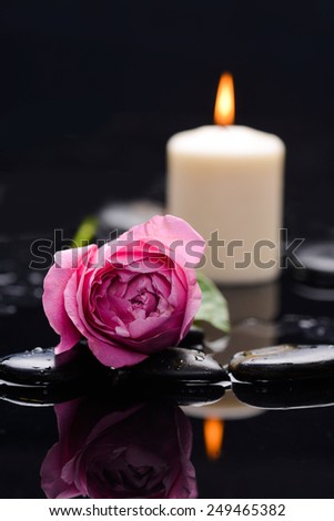 Beautiful rose with candle and therapy stones ,Valentines Day background