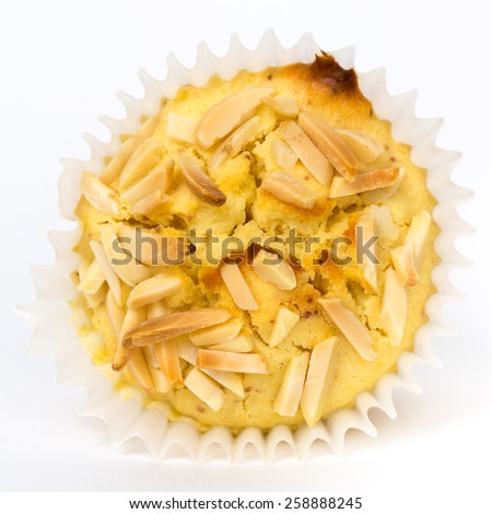 Macro of a muffin with sliced almonds added on top - Shallow depth of field