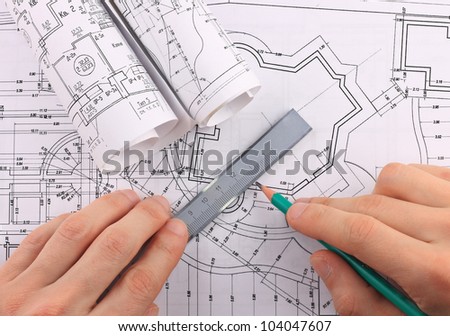 Architectural blueprints rolls and development of technology project
