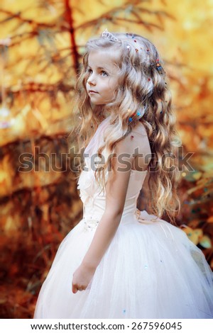Cute little girl walks in the woods. Summer, sunlight, portrait, warm, forest.